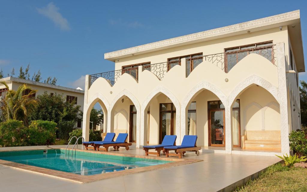 Private pool villa with arched terrace at JAZ Aurora, Zanzibar
